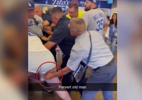 Pervertido toca a mujer en pelea entre aficionadas de Dodgers