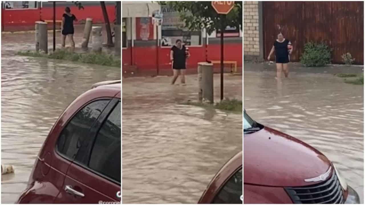 VIDEO: Mujer cruza calle inundada....por el antojo de un refresco