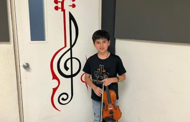 Destaca niño violinista de 10 años en la Filarmónica Juvenil de Nuevo León