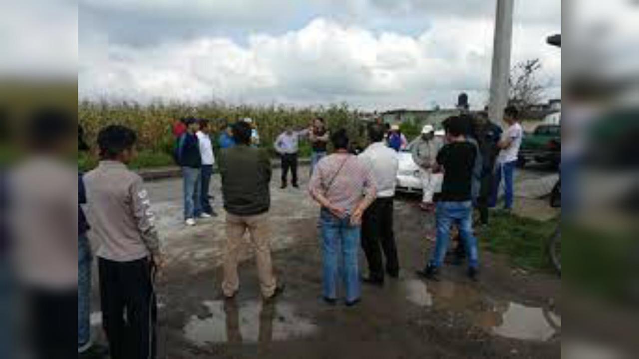 Los cuerpos sin vida de dos mujeres, reportadas como desaparecidas, fueron localizados en el patio de una casa en San Cristóbal Huichochitlán, en Toluca; trasciende que hay cuatro personas detenidas por esos hechos. Foto: Cortesía