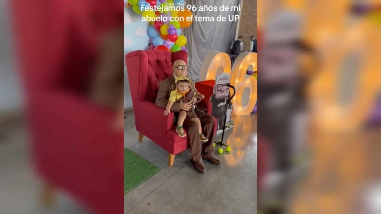 Ataviado con un traje color café e incluso con un bastón que tenía pelotas de tenis, similar al personaje de Carl Fredricksen llegó al salón de eventos decorado con globos. Foto: Captura de pantalla