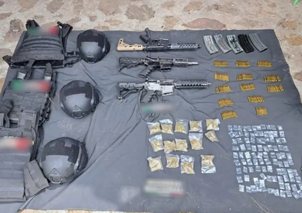 Desmantela GN campamento clandestino en Michoacán, aseguran armas y drogas