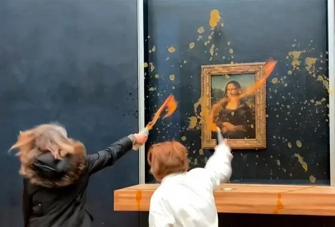 Vandalizan activistas contra el cambio climático la Mona Lisa en París