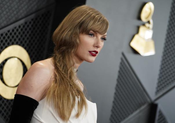 Papá de Taylor Swift, acusado de golpear a fotógrafo (VIDEO)