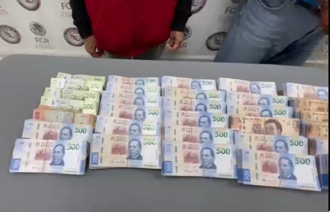 FGR detiene a pareja con 2 millones de pesos. Foto. Cortesía