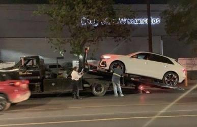 Recuperan camioneta de lujo tras cateo a un taller mecánico