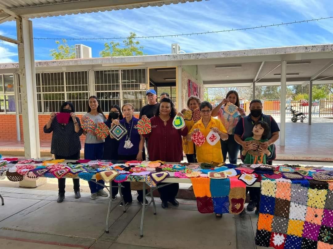 Grupo de personas que participaron en la campaña Grafiti Tejido 2023. I Foto: Gobierno de México.