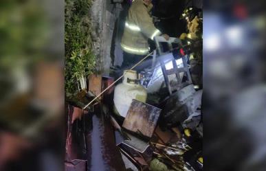 Explosión e incendio en vivienda en Metepec