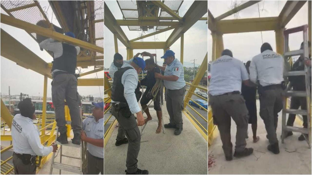 Hombre es rescatado en puente peatonal de la colonia Cumbres Primer Sector. Foto. Policía de Monterrey