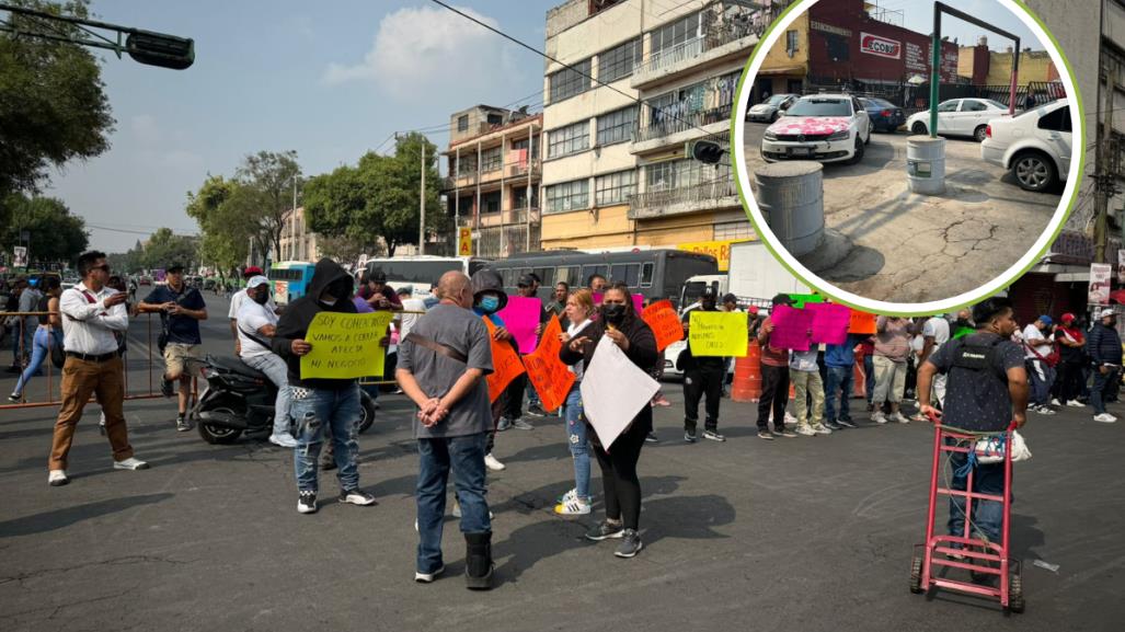 Comerciantes y vecinos bloquean Circunvalación por colocación de arcos de acceso