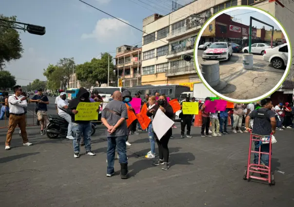 Comerciantes y vecinos bloquean Circunvalación por colocación de arcos de acceso