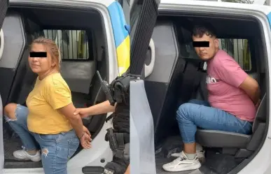 Detienen a pareja por robo en negocio
