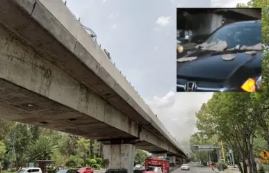 ¡Cuidado! Concreto de la Línea 4 del Metro cae sobre auto en Venustiano Carranza