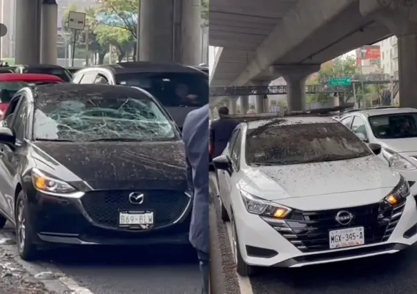 Canaleta cae del segundo piso del Periférico y destroza parabrisas de auto