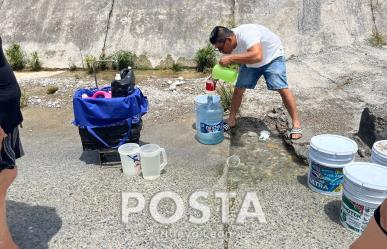 Escasez de agua en Barrio del Prado: Vecinos recolectan agua de arroyo