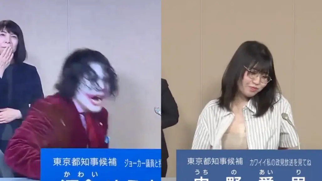 Mientras tanto en Tokio… candidato se disfraza de Joker y otra se quita la blusa