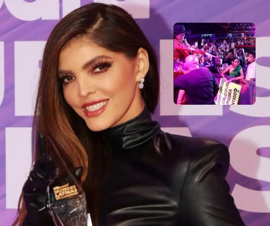 Ana Barbara sube a una coahuilense a cantar con ella en la feria de San buena. Foto de Ana Escobedo.