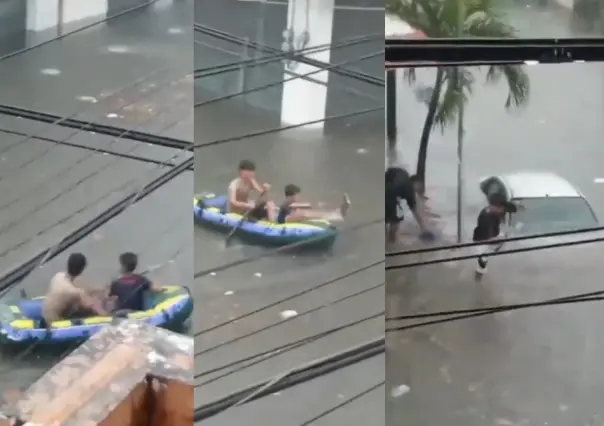 Lluvias inundan colonias de Veracruz: jóvenes se tiran clavados y reman en balsa