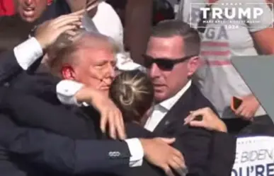 Atentado contra Donald Trump; lo reportan herido tras tiroteo en mitin | VIDEO