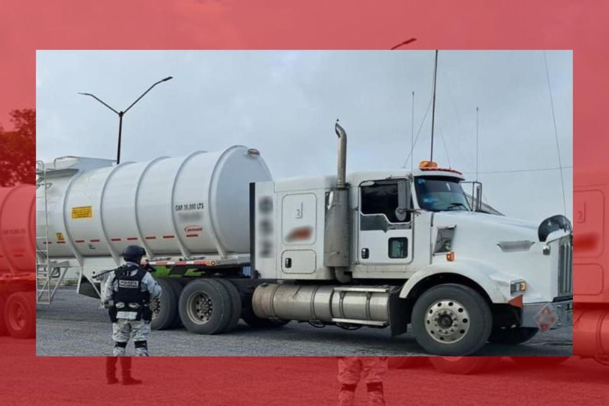 Tractocamión y un elemento de la Guardia Nacional. Foto: Guardia Nacional