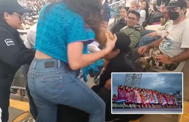 Tres mujeres y una piña: Mujeres pelean en la Guelaguetza de Oaxaca por una piña