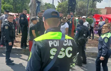 Intentan linchar comerciantes de Coyoacán a ladrón, policías lo rescatan