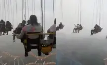 Personas se quedan varadas en juego mecánico de Six Flags por lluvias | VIDEO
