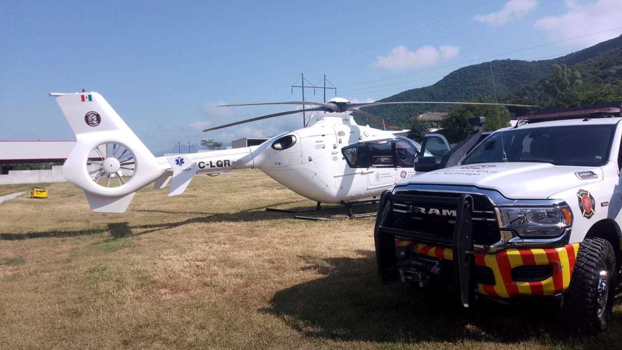 Helicóptero y unidad de Protección Civil Nuevo León. Foto: PC Santiago