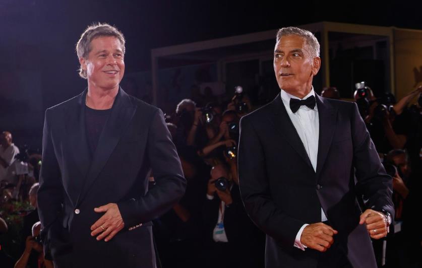 Brad Pitt y George Clooney, las estrellas de Venecia. Foto. AP Captura de Imagen