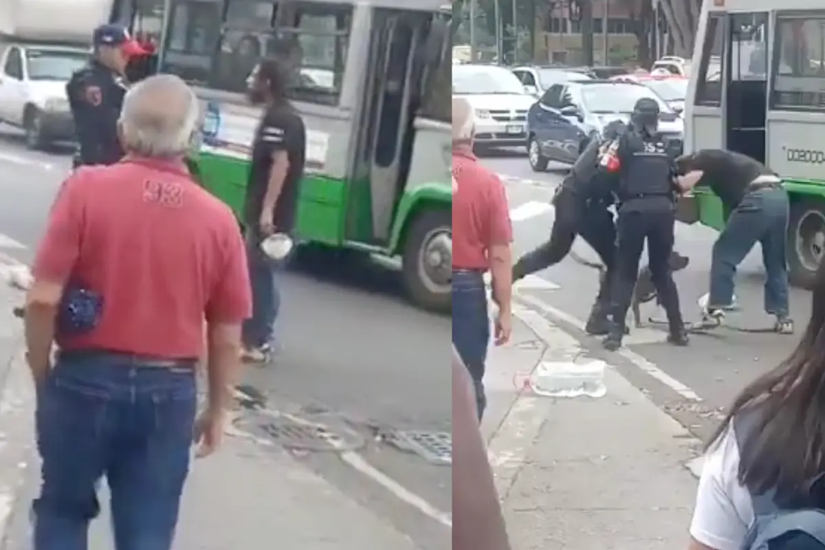 Policía confrontando a señor que presuntamente agredió a su mascota. Foto: Captura de pantalla