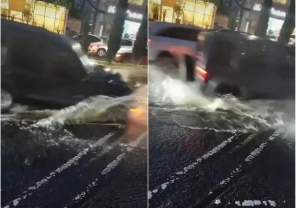 ¿Un bachesito? Bache destroza auto (VIDEO)