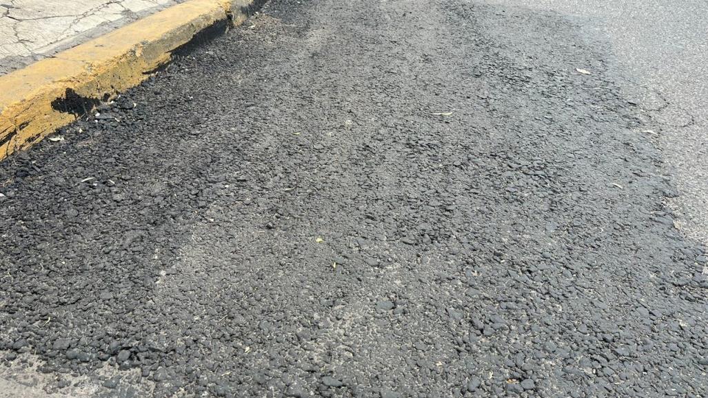 Reparan afectación en calle recién pavimentada