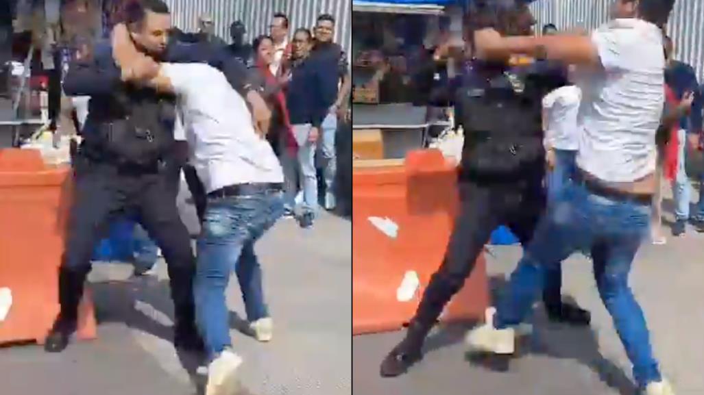 VIDEO: Policía y civil protagonizan pelea a puño limpio en Benito Juárez