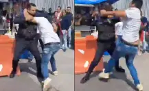 VIDEO: Policía y civil protagonizan pelea a puño limpio en Benito Juárez