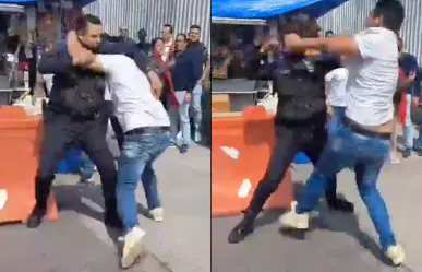 VIDEO: Policía y civil protagonizan pelea a puño limpio en Benito Juárez