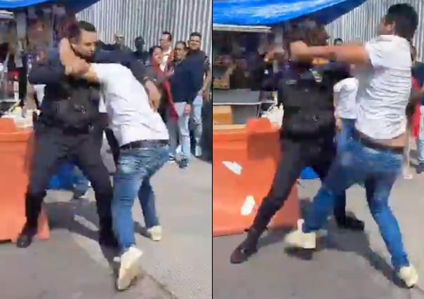 VIDEO: Policía y civil protagonizan pelea a puño limpio en Benito Juárez