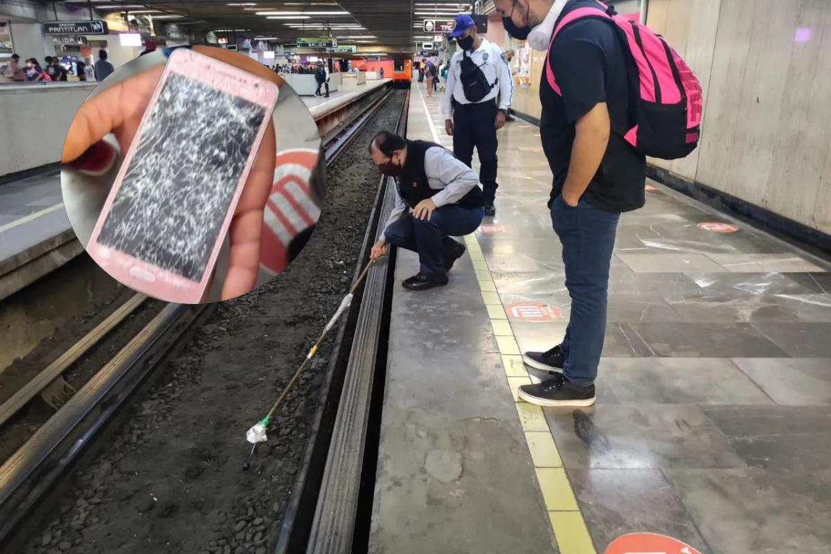 Celular roto en las vías del Metro de CDMX. Foto: @MetroCDMX