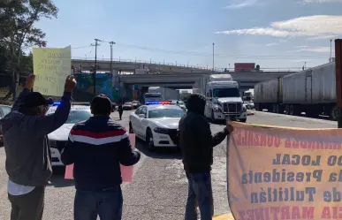 Manifestación en la México-Querétaro: Denuncian despojo de predios