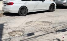 Vecinos de Mérida se quejan de baches y fugas de agua en la colonia Miraflores