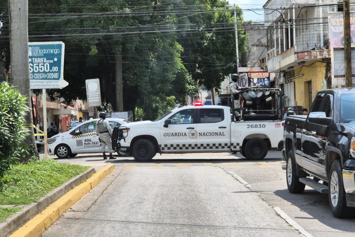 Elementos de la Guardia Nacional resguardando la escena del crimen Foto: Armando de la Rosa