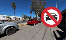 Convierten carril de un bulevar de Durango en estacionamiento público