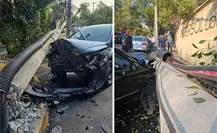 Choque de auto derriba poste en la alcaldía Miguel Hidalgo, hay dos heridos