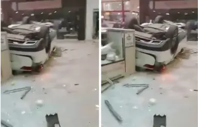 Cae auto desde el tercer piso del estacionamiento de Plaza Lilas en CDMX 