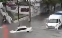 Intensas lluvias dejan autos inundados en Coacalco, Edomex