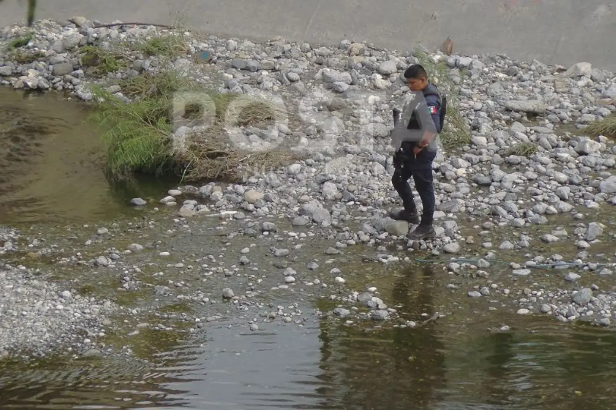 Autoridades atienden el reporte de una cabeza humana tirada en Apodaca/Foto: Ray Elizalde