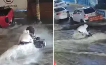 VIDEO | Joven arriesga su vida para salvar su moto de las inundaciones en Edomex