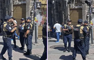Comerciantes se enfrentan con policías en centro de Puebla; hay 3 lesionados