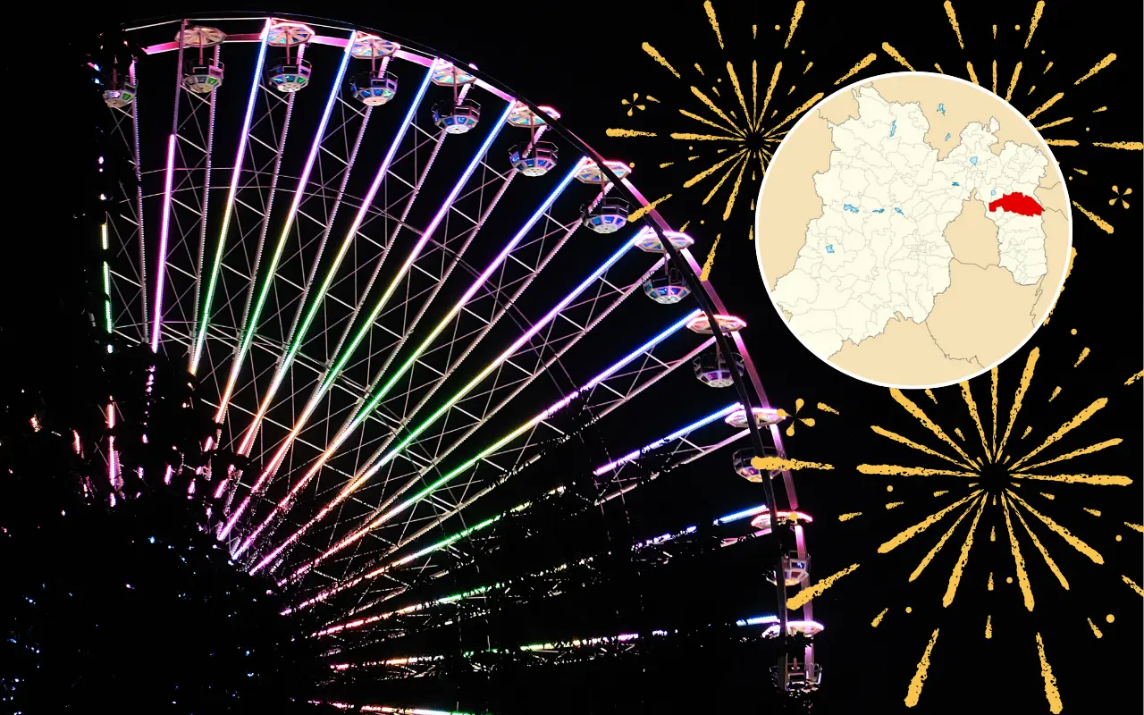 Rueda de la fortuna y espectáculo de fuegos artificiales al anochecer. Foto: Canva