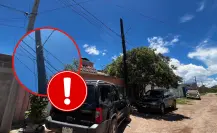 Poste de teléfono cae de a poco hacia una casa de Durango 