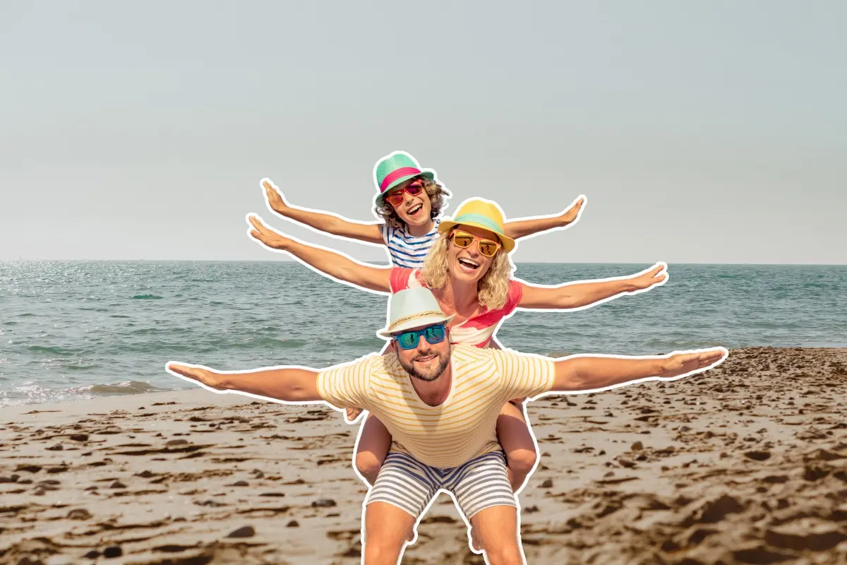 Una familia y la playa. Foto: Canva